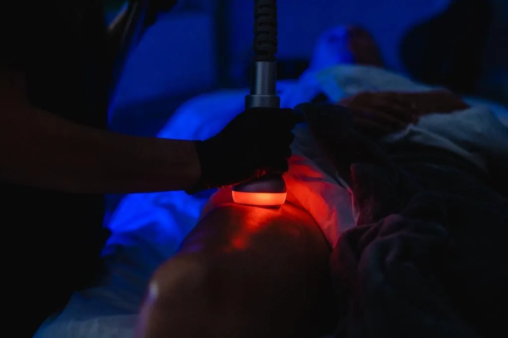 Handheld cold and light body treatment
